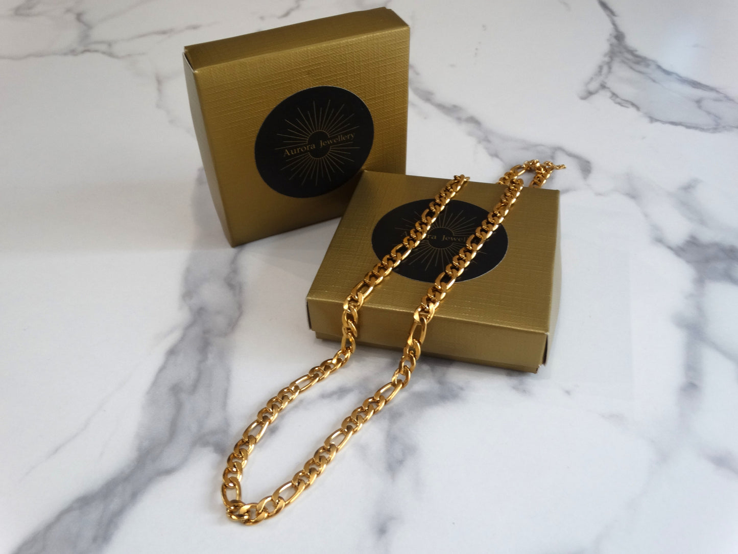 "Figaro gold chain"